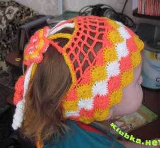 Вязаная шапочка-повязка для девочки